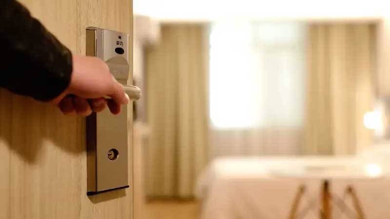 Bedroom door handle being opened