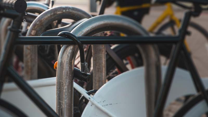 Bike D-lock locking bike to post